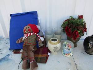 lot 276 image: Christmas ginger bread girl, bags and table matts, Cinderella snow globe 2 vases and more