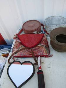 lot 281 image: pancake warmer, metal vase, heart shaped mirror, red sparkle purse
