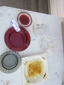 lot 21 image: Lot of ash treys qty 7 and a red smoke candle