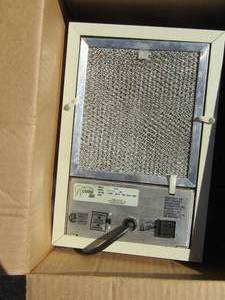 lot 33 image: Living Air filter has 3 extra filters, model # XL15, serial # 484585