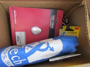 lot 36 image: small box of misc. door knobs and handles