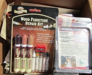 lot 37 image: small lot of furniture repair kits, markers, glue pens, leather and wood repair