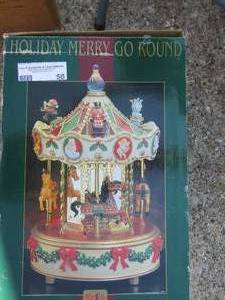 lot 50 image: Christmas merry go round By Miasto