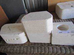 lot 60 image: ceramic molds including 3 seal pups, heart belly bear candle, rope mug,