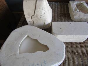 lot 66 image: Tejays mold Christmas tree ceramic mold, Nowell molds unicorns, and a 3 piece stand up Christmas tree