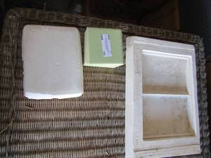 lot 70 image: 10 light green tiles, and a book ceramic mold
