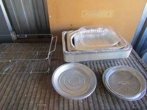lot 71 image: aluminum pan lot with stand some have lids, turkey pans and pie pans