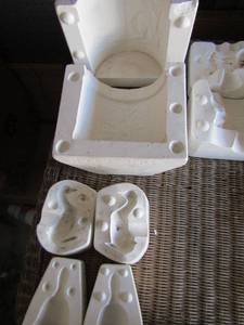 lot 74 image: ceramic mold lot includes one star and a duck, a bell, Santa, a fireplace and a candy bowl