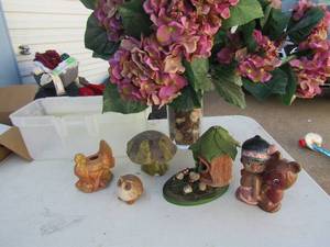 lot 84 image: Large clear glass vase with wax flowers, ceramic mold finishes includes, turkey, Indian girl and bear, tee-pee, mushroom tree