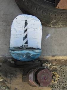 lot 87 image: Light house wall hanger, light house table top dcor