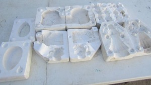 lot 89 image: ceramic mold lot, egg bottom, Large bunny family, clown bank, wicker cradle planter