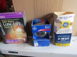 lot 95 image: box of new and used light bulbs, 60 watt, 75 watt, 100 watt