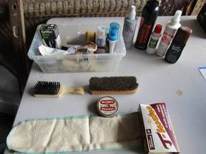 lot 109 image: Shoe shine brushes, waxes, polishes and sprays all used some still full