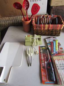 lot 113 image: Kitchen lot , chop sticks, GE mixer, thermos mate for beef, fish and chicken new, folding cutting board also used for scoop
