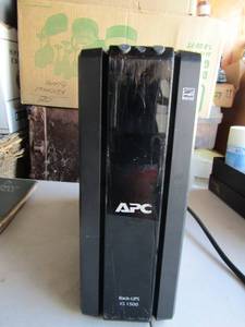 lot 125 image: APC battery surge back up 1500xs has multi plugs in one,