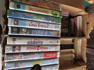 lot 129 image: Box of Disney VHS tapes including, Bambi, Jungle , george, Little Mermaid, and so many more