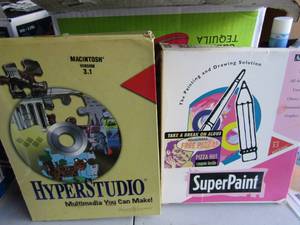 lot 144 image: game lot includes super paint book, hyperstudio multimedia book, puzzles, kid pix cds