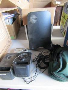 lot 145 image: primefilm 3650u, 2 logitech speakers one has headphone and aux ports, a olympus camedia camera