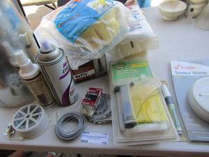 lot 19 image: breather clean filter, pipe wrap, tub of glue sticks, can of detain and more