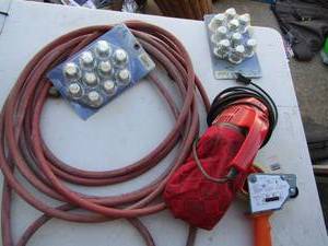 lot 153 image: 2 new packs of steel power lug nut covers, red air hose, hand held dirt devil vaccum cleaner