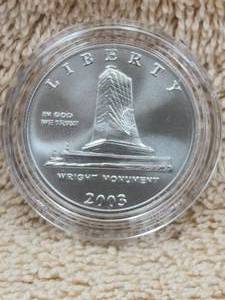 lot 57 image: 2003 First Flight Commemorative Half Dollar - uncirculated