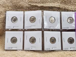 lot 83 image: 8 Brilliant uncirculated Roosevelt Dimes -