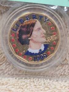 lot 117 image: Susan B. Anthony Dollar 1999 - colorized collector coin