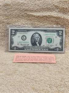 lot 125 image: 1976 $2 bill with U.S. Post Office cancellation stamp