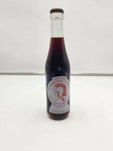 lot 64 image: 1972 & 1983 State Basketball Champions- First High School Band in the USA - Connersville High School - unopened soda bottle