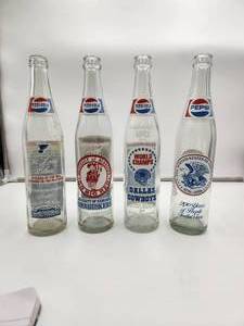 lot 100 image: Selection of 4 vintage empty Pepsi bottles