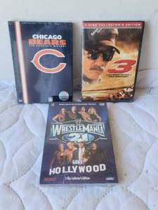 lot 128 image: Selection of 3 unopened DVDs Earnhardt, Bears, and Wrestle Mania