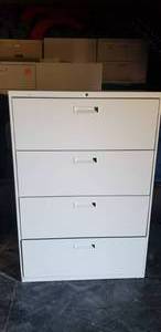 lot 94 image: HON 4-Drawer Lateral File Cabinet w Key