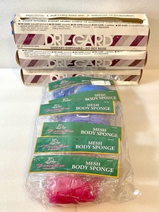 lot 85 image: Lot of 9 - (3) New Other Dri-Gard Sanitary Disposable Perforated Units (150 Total) & (6) New Fanta Sea Cosmetics Mesh Body Sponge, Assorted Colors