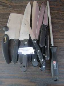 lot 44 image: various size knife lot, steak knifes, slicers and a knife sharpner
