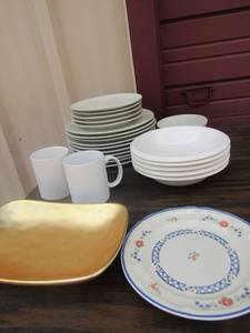 lot 59 image: Lot of various kitchen dishes, Newcore saucer qty1 ,  solid white soup bowls qty5,  2 coffee cups, off white dinner plates qty 10, saucers qty 5, 1 bowl