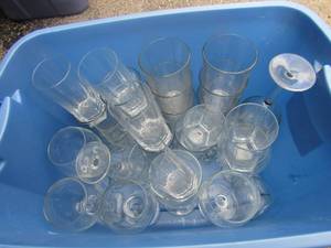 lot 60 image: Blue tub full of clear glass wine and drinking glasses