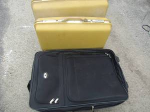 lot 69 image: Black leisure rolling suitcase with handle, 2 vintage yellow suitcases no brand good condition