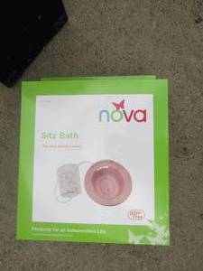 lot 72 image: Nova Sitz bath NIB fits most standard size toilets