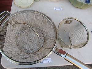 lot 87 image: 2 deep fryer baskets 1 has a lid