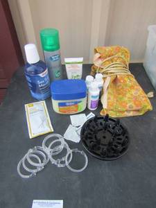 lot 107 image: Heating pad, medline soaps, lotions, various other bathroom personal items