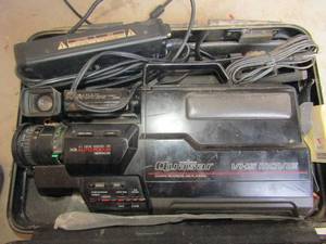 lot 165 image: VHS movie recorder with case and battery charger unknown working order