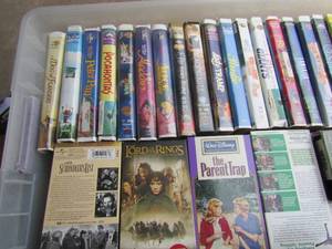 lot 168 image: Large tote of Disney VHS. tapes qty over 30, all in case unknown if work great, all the Disney characters