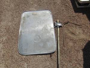 lot 194 image: short piece of re bar, pump jack and tire tool