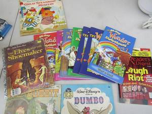 lot 212 image: Kids wonder devotional book set, read along kids books the hobbit, dumbo, the elves and the shoemaker, the great steam boat mystery