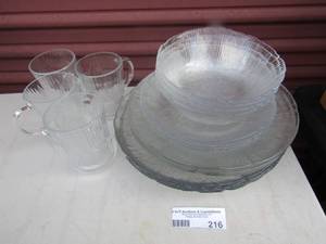 lot 216 image: clear glass dish set, 4 bowls, 4 salad plates, 4 dinner plates, 4 saucers and 4 handled cups