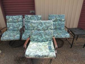 lot 4 image: Set of patio chair furniture swivels, has new or like new cushion covers, qty 4 plus 1 table 201818 great condition