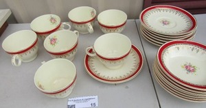 lot 15 image: Taylor Smith Taylor China dishes, 7 handled cups & saucers, 8 Small bread plates
