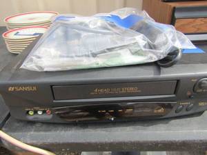 lot 223 image: Sansui VHS player with remote and original paperwork,