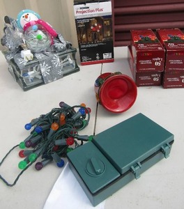 lot 233 image: glass block decorated for Christmas with a snow man and lights, 4 packs of colorful lights, scented plus Christmas light dcor, electric LED brookstone