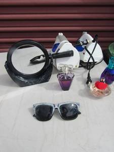 lot 234 image: 2 irons, hand help make up mirror, sunglasses, 3 bottles of perfume